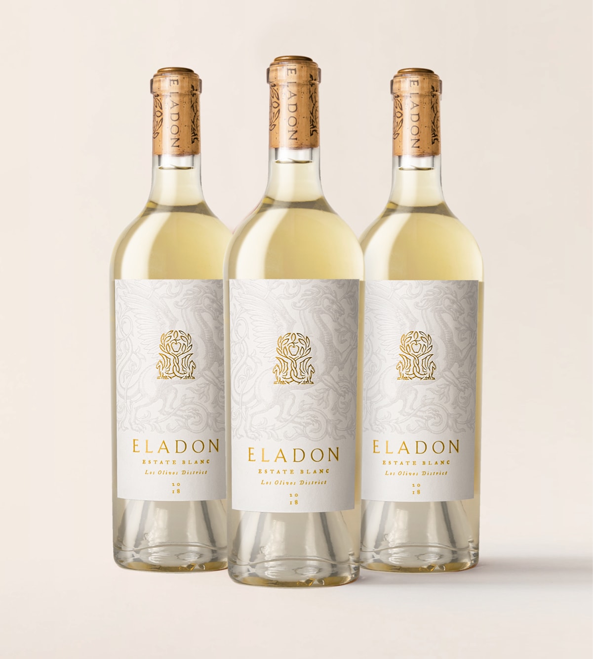 Three bottles of Eladon Estate Blanc wine